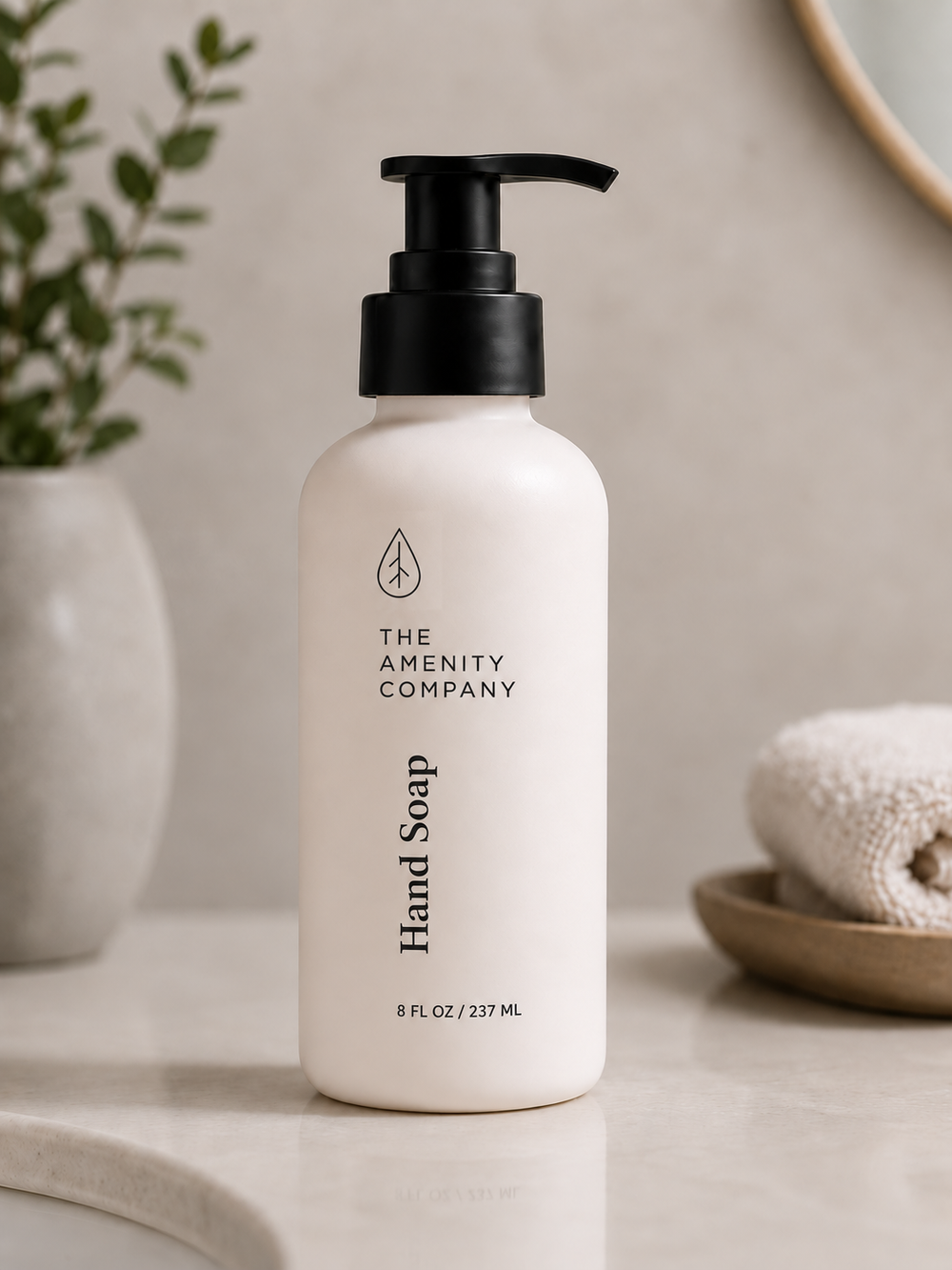 Matte hand soap pump bottle on a bathroom vanity